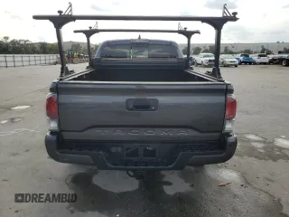 2020 Toyota Tacoma SR5 z VIN 3TYDZ5BN9LT000209, wystawiony jako Copart lot #56127875 z przebiegiem 92 350 mil mil oraz Szkoda całkowita • Salvage title. Historia ofert i sprzedaży dostępna na DreamBid. Obrazek 6.