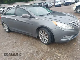 2012 Hyundai Sonata SE z VIN 5NPEC4AC7CH435022, wystawiony jako IAAI lot #42491555 z przebiegiem 176 670 mil mil oraz . Historia ofert i sprzedaży dostępna na DreamBid. Obrazek 1.