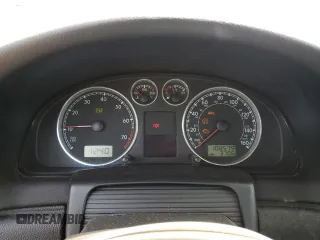 2003 Volkswagen Passat z VIN WVWPH63B83P389277, wystawiony jako Copart lot #66245594 z przebiegiem 108 579 mil mil oraz Szkoda całkowita • Salvage title. Historia ofert i sprzedaży dostępna na DreamBid. Obrazek 9.