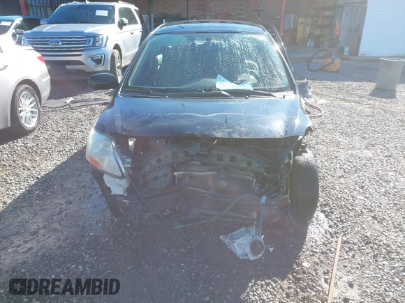 2007 Toyota Yaris with VIN JTDBT923971098915, listed as a IAAI auction lot 41577424 with 234,959 mi miles. Bid and sale history available at carsss.com. Image 13.