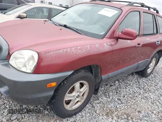 2002 Hyundai Santa Fe GLS with VIN KM8SC73D72U306997, listed as a IAAI auction lot 41519773 with 244,398 mi miles. Bid and sale history available at carsss.com. Image 13.