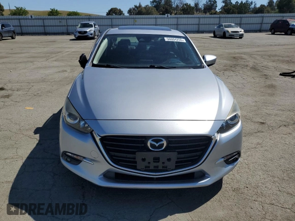2017 Mazda 3 Grand Touring z VIN 3MZBN1W37HM141705, wystawiony jako Copart lot #56604255 z przebiegiem 62 308 mil mil oraz Szkoda całkowita • Salvage title. Historia ofert i sprzedaży dostępna na DreamBid. Obrazek 5.