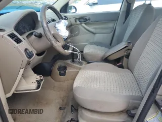 2006 Ford Focus S z VIN 1FAFP34N46W154378, wystawiony jako Copart lot #58422605 z przebiegiem Nie podano mil oraz Szkoda całkowita • Salvage title. Historia ofert i sprzedaży dostępna na DreamBid. Obrazek 7.