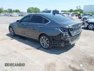 2018 Genesis G80 3.8L z VIN KMHGN4JE1JU253478, wystawiony jako IAAI lot #42066296 z przebiegiem 84 226 mil mil oraz . Historia ofert i sprzedaży dostępna na DreamBid. Obrazek 3.