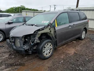 2014 Toyota Sienna XLE z VIN 5TDYK3DC1ES469797, wystawiony jako Copart lot #56211325 z przebiegiem 81 839 mil mil oraz Szkoda całkowita • Salvage title. Historia ofert i sprzedaży dostępna na DreamBid. Obrazek 1.