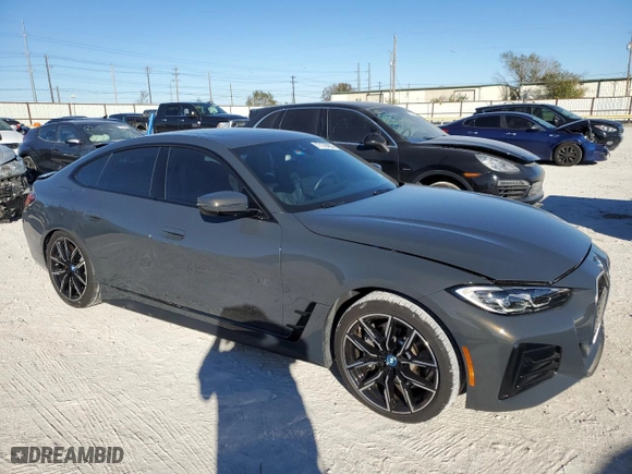 2023 BMW i4 eDrive40 with VIN WBY73AW09PFN91308, listed as a Copart auction lot 77179493 with 4,301 mi miles. Bid and sale history available at carsss.com. Image 4.