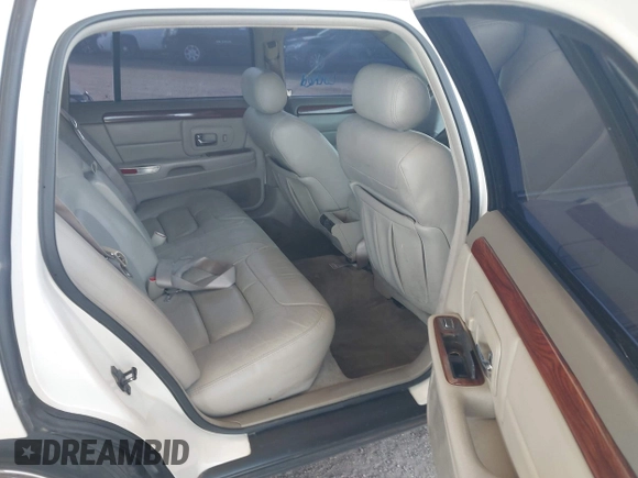 1999 Cadillac DeVille z VIN 1G6KD54YXXU794294, wystawiony jako IAAI lot #42141931 z przebiegiem 161 408 mil mil oraz . Historia ofert i sprzedaży dostępna na DreamBid. Obrazek 8.
