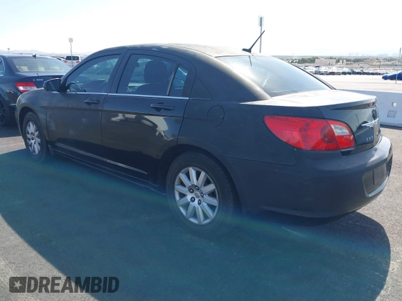 2010 Chrysler Sebring Touring with VIN 1C3CC4FB6AN207070, listed as a IAAI auction lot 42131880 with 155,362 mi miles. Bid and sale history available at carsss.com. Image 3.