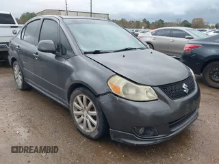 2012 Suzuki SX4 with VIN JS2YC5A55C6300349, listed as a IAAI auction lot 41472004 with 178,487 mi miles and . Bid and sale history available at DreamBid. Image 1.