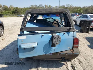 1995 Geo Tracker z VIN 2CNBE18UXS6930601, wystawiony jako Copart lot #76079094 z przebiegiem 276 136 mil mil oraz Szkody całkowita. Historia ofert i sprzedaży dostępna na DreamBid. Obrazek 6.