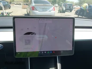 2020 Tesla Model 3 Standard Range Plus with VIN 5YJ3E1EAXLF615781, listed as a IAAI auction lot 42068935 with 96,026 mi miles. Bid and sale history available at carsss.com. Image 18.
