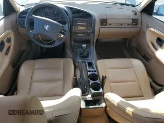 1998 BMW 3 Series 318i with VIN WBACC9322WEE60455, listed as a Copart auction lot 75950324 with 328,714 mi miles and Salvage Title. Bid and sale history available at carsss.com. Image 8.