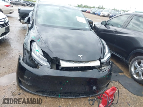 2023 Tesla Model Y Long Range with VIN 7SAYGDEE3PA024315, listed as a IAAI auction lot 41900788 with Not Provided miles. Bid and sale history available at carsss.com. Image 18.