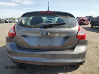 2014 Ford Focus SE z VIN 1FADP3K28EL104745, wystawiony jako Copart lot #54496215 z przebiegiem 154 565 mil mil oraz Szkoda całkowita • Salvage title. Historia ofert i sprzedaży dostępna na DreamBid. Obrazek 6.