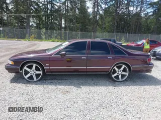 1994 Chevrolet Caprice LS z VIN 1G1BN52P2RR130218, wystawiony jako IAAI lot #42222080 z przebiegiem Nie podano mil oraz . Historia ofert i sprzedaży dostępna na DreamBid. Obrazek 15.
