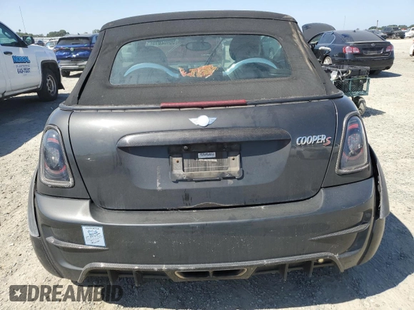 2011 MINI Convertible S с VIN WMWZP3C59BT249133, выставлен на аукционе Copart как лот 56402615 с пробегом 103 809 миль миль и Списание • Salvage title. История ставок и продаж доступна на DreamBid. Изображение 6.