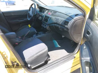 2002 Mitsubishi Lancer OZ-Rally z VIN JA3AJ86EX2U073129, wystawiony jako IAAI lot #42337379 z przebiegiem 257 556 mil mil oraz . Historia ofert i sprzedaży dostępna na DreamBid. Obrazek 5.