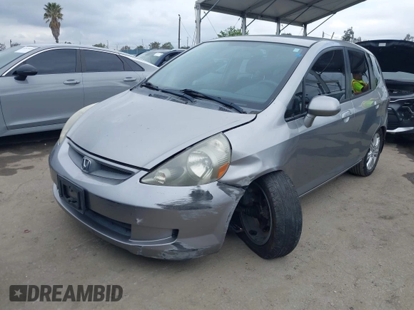 2007 Honda Fit with VIN JHMGD37467S065669, listed as a IAAI auction lot 42078795 with 124,030 mi miles. Bid and sale history available at carsss.com. Image 2.