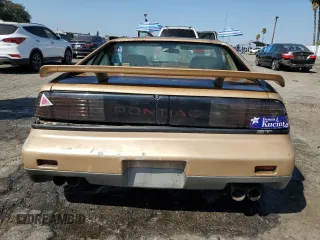 1987 Pontiac Fiero GT z VIN 1G2PG1194HP216891, wystawiony jako Copart lot #72103234 z przebiegiem 55 013 mil mil oraz Tytuł czysty. Historia ofert i sprzedaży dostępna na DreamBid. Obrazek 6.