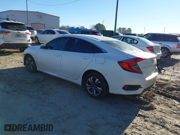 2017 Honda Civic LX z VIN 19XFC2F50HE007646, wystawiony jako IAAI lot #41360121 z przebiegiem 133 800 mil mil oraz . Historia ofert i sprzedaży dostępna na DreamBid. Obrazek 3.