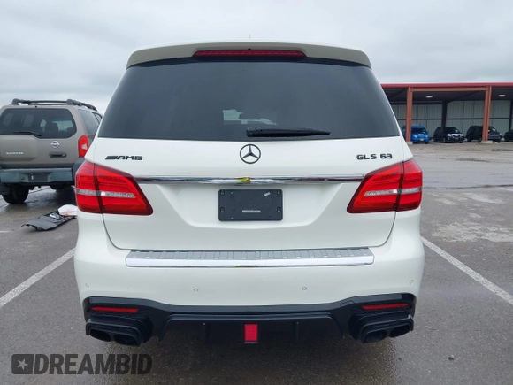 2018 Mercedes-Benz GLS 63 AMG with VIN 4JGDF7FE1JB099084, listed as a IAAI auction lot 42220385 with 97,904 mi miles and . Bid and sale history available at DreamBid. Image 16.