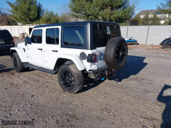 2023 Jeep Wrangler 4xe Sahara with VIN 1C4JJXP61PW684682, listed as a IAAI auction lot 40998281 with 41,138 mi miles. Bid and sale history available at carsss.com. Image 3.