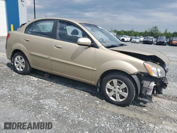 2011 Kia Rio with VIN KNADH4B30B6712241, listed as a Copart auction lot 61301184 with 159,902 mi miles and Salvage Title. Bid and sale history available at DreamBid. Image 4.