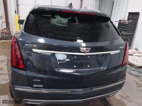 2021 Cadillac XT5 AWD Premium Luxury with VIN 1GYKNDRS1MZ148806, listed as a IAAI auction lot 41269703 with 31,739 mi miles. Bid and sale history available at carsss.com. Image 16.