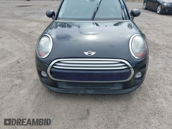 2015 MINI Hardtop 4 Door z VIN WMWXS5C58FT828427, wystawiony jako IAAI lot #42395620 z przebiegiem 102 282 mil mil oraz . Historia ofert i sprzedaży dostępna na DreamBid. Obrazek 6.
