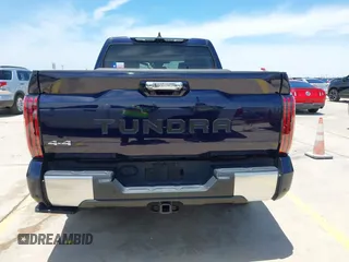 2023 Toyota Tundra Limited with VIN 5TFJA5DB9PX117183, listed as a IAAI auction lot 42352970 with 15,082 mi miles and . Bid and sale history available at DreamBid. Image 16.