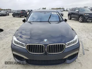 2019 BMW 7 Series M760i xDrive with VIN WBA7H6C51KG615276, listed as a Copart auction lot 79597234 with 39,195 mi miles and Salvage Title. Bid and sale history available at carsss.com. Image 5.