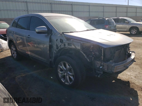 2015 Mazda CX-9 Sport with VIN JM3TB3BA7F0454891, listed as a Copart auction lot 42414995 with 68,856 mi miles and Salvage Title. Bid and sale history available at DreamBid. Image 4.