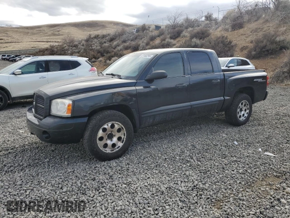 2006 Dodge Dakota SLT with VIN 1D7HW48NX6S665497, listed as a Copart auction lot 47468295 with 215,427 mi miles and Salvage Title. Bid and sale history available at carsss.com. Image 1.