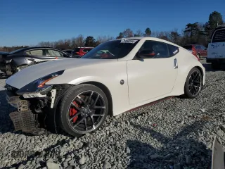2016 Nissan 370Z z VIN JN1AZ4EH7GM937014, wystawiony jako Copart lot #83560164 z przebiegiem 52 745 mil mil oraz Szkoda całkowita • Salvage title. Historia ofert i sprzedaży dostępna na DreamBid. Obrazek 1.