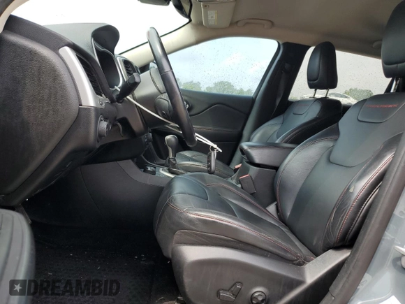 2014 Jeep Cherokee Trailhawk z VIN 1C4PJMBS4EW156550, wystawiony jako Copart lot #56870165 z przebiegiem 100 184 mil mil oraz Szkoda całkowita • Salvage title. Historia ofert i sprzedaży dostępna na DreamBid. Obrazek 7.