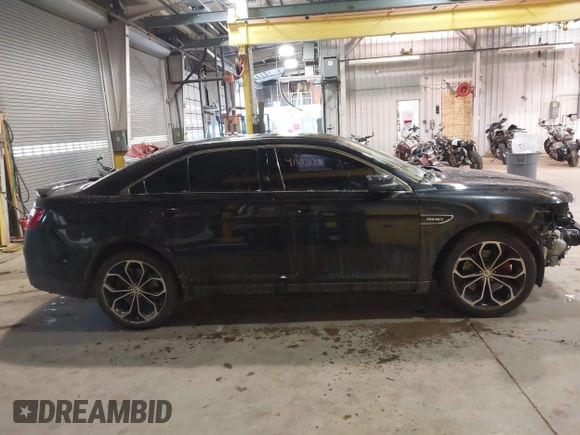 2015 Ford Taurus SHO with VIN 1FAHP2KT1FG181553, listed as a IAAI auction lot 41375137 with 121,006 mi miles and . Bid and sale history available at DreamBid. Image 14.