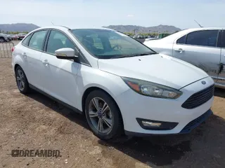 2016 Ford Focus SE z VIN 1FADP3FEXGL362756, wystawiony jako IAAI lot #41944236 z przebiegiem 23 326 mil mil oraz . Historia ofert i sprzedaży dostępna na DreamBid. Obrazek 1.