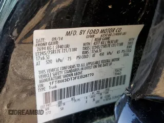 2015 Ford F-350 Lariat with VIN 1FT8W3DT3FEB28770, listed as a Copart auction lot 43983105 with 112,762 mi miles and Salvage title. Bid and sale history available at DreamBid. Image 14.