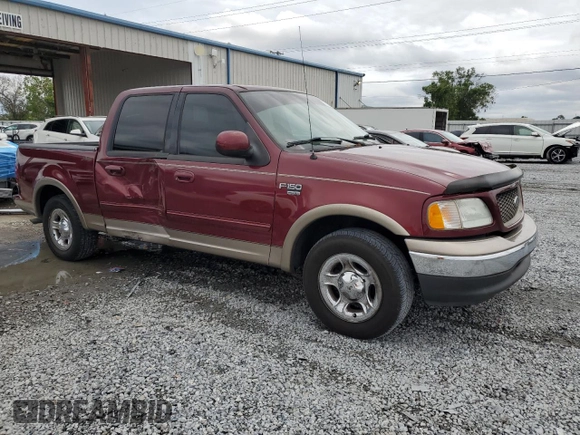 2003 Ford F-150 XLT with VIN 1FTRW07673KA75061, listed as a Copart auction lot 52034595 with Not Provided miles and Salvage Title. Bid and sale history available at carsss.com. Image 4.