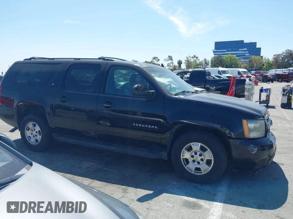 2011 Chevrolet Suburban LT with VIN 1GNSCJE0XBR285973, listed as a IAAI auction lot 42007844 with 252,994 mi miles. Bid and sale history available at carsss.com. Image 13.