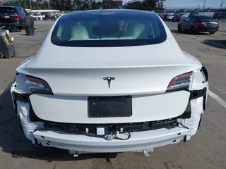 2023 Tesla Model 3 with VIN 5YJ3E1EA6PF495631, listed as a IAAI auction lot 41568118 with 10,073 mi miles and . Bid and sale history available at DreamBid. Image 17.