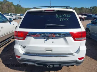 2012 Jeep Grand Cherokee Laredo with VIN 1C4RJEAG5CC106203, listed as a IAAI auction lot 41821138 with 157,474 mi miles. Bid and sale history available at carsss.com. Image 16.