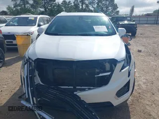 2017 Cadillac XT5 FWD with VIN 1GYKNARS0HZ107734, listed as a IAAI auction lot 41882031 with 89,397 mi miles. Bid and sale history available at carsss.com. Image 13.