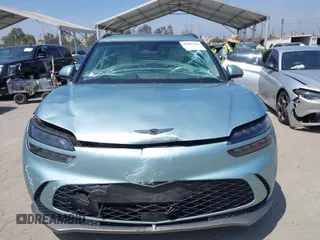2023 Genesis GV60 Advanced z VIN KMUKCDTC8PU010482, wystawiony jako IAAI lot #42087483 z przebiegiem 92 233 mil mil oraz . Historia ofert i sprzedaży dostępna na DreamBid. Obrazek 12.