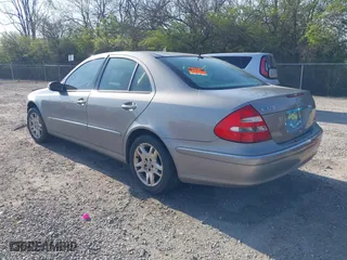 2003 Mercedes-Benz E-Class 3.2L with VIN WDBUF65J93X099223, listed as a IAAI auction lot 42033473 with 230,758 mi miles. Bid and sale history available at carsss.com. Image 3.
