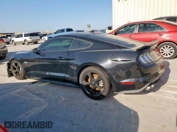 2021 Ford Mustang GT with VIN 1FA6P8CFXM5132329, listed as a Copart auction lot 52425335 with 49,262 mi miles and Salvage title. Bid and sale history available at DreamBid. Image 2.