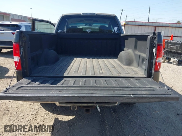2005 Ford F-150 XLT with VIN 1FTPX12585NA67903, listed as a IAAI auction lot 41856821 with 174,847 mi miles. Bid and sale history available at carsss.com. Image 13.