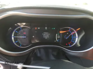 2023 Chrysler Pacifica Hybrid Touring L with VIN 2C4RC1L79PR608659, listed as a Copart auction lot 56945365 with 45,697 mi miles and Salvage title. Bid and sale history available at DreamBid. Image 9.