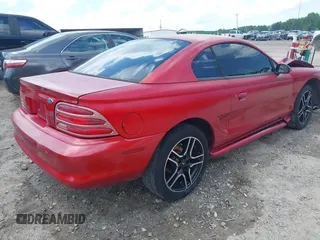 1994 Ford Mustang with VIN 1FALP4047RF117240, listed as a IAAI auction lot 42315542 with 120,825 mi miles and . Bid and sale history available at DreamBid. Image 4.