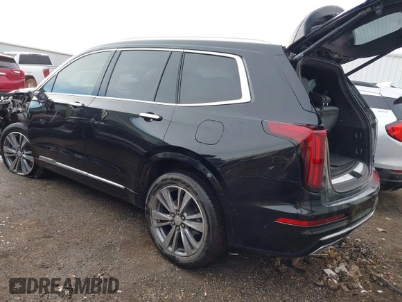 2021 Cadillac XT6 Premium Luxury z VIN 1GYKPDRS9MZ120150, wystawiony jako IAAI lot #41715368 z przebiegiem 47 835 mil mil oraz . Historia ofert i sprzedaży dostępna na DreamBid. Obrazek 3.